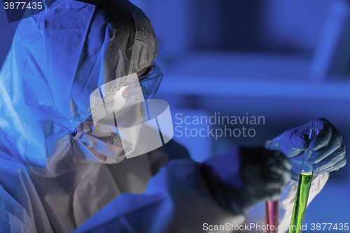 Image of close up of scientist making test in laboratory