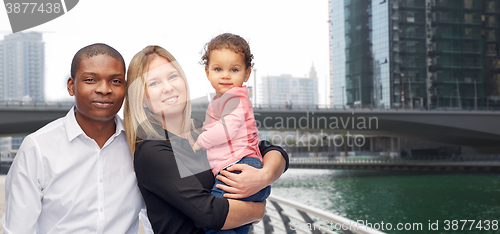 Image of multiracial family with little child in dubai