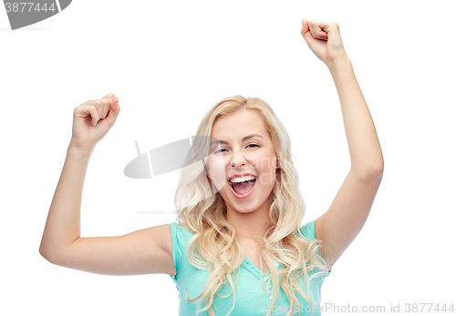 Image of happy young woman or teen girl celebrating victory