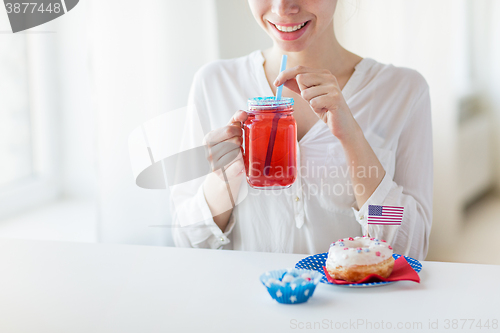 Image of happy woman celebrating american independence day