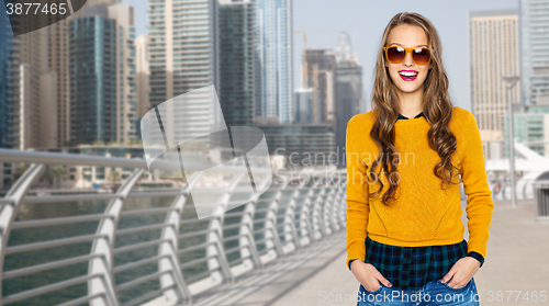 Image of happy young woman or teen girl in casual clothes