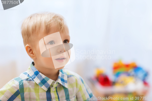 Image of happy little baby boy at home