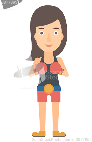 Image of Confident boxer in gloves.