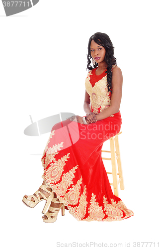 Image of African American woman in a red dress.