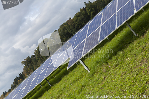 Image of Field with blue siliciom solar cells alternative energy