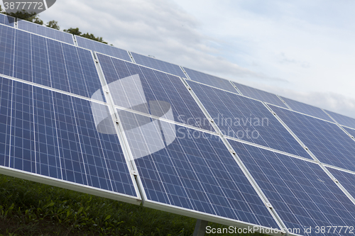 Image of Field with blue siliciom solar cells alternative energy