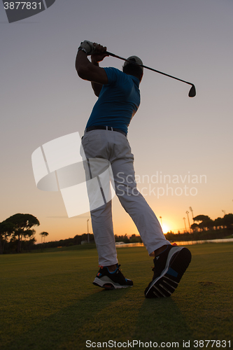 Image of golfer hitting long shot