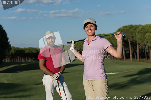 Image of portrait of couple on golf course
