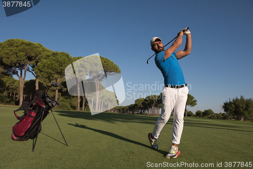 Image of golf player hitting shot