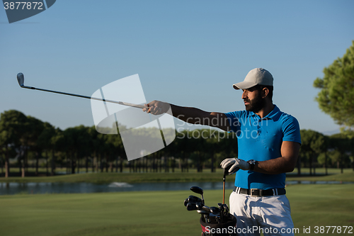Image of golfer  portrait at golf  course