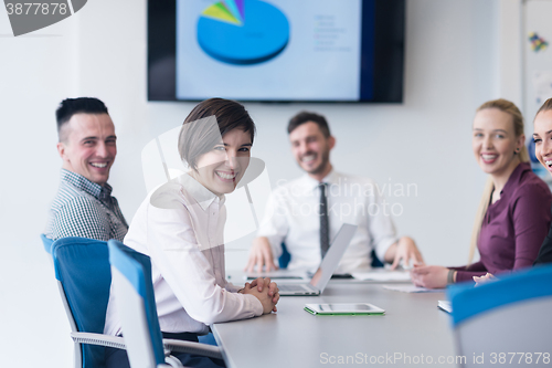 Image of young business people group on team meeting at modern office