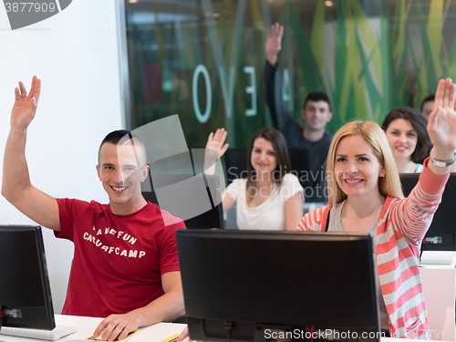 Image of technology students group in computer lab school  classroom
