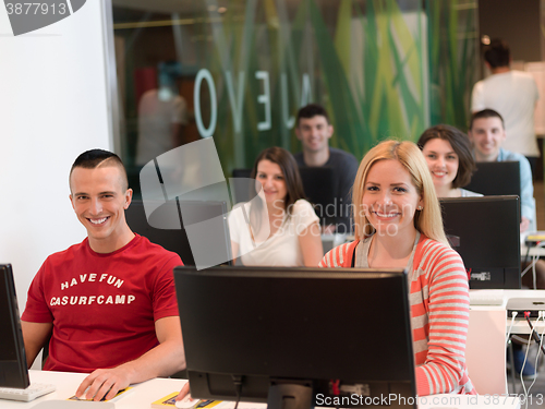 Image of technology students group in computer lab school  classroom