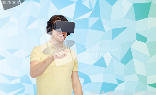 Image of happy man in virtual reality headset or 3d glasses