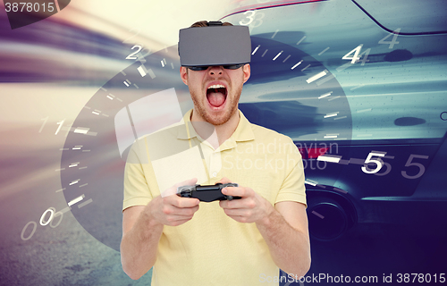 Image of man in virtual reality headset and car racing game