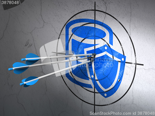 Image of Programming concept: arrows in Database With Shield target on wall background