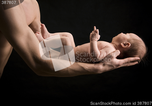 Image of baby giving the middle finger