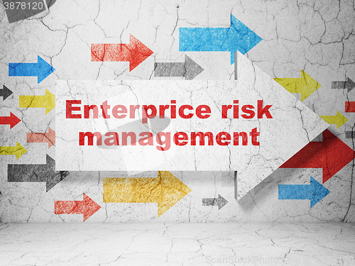 Image of Business concept: arrow with Enterprice Risk Management on grunge wall background