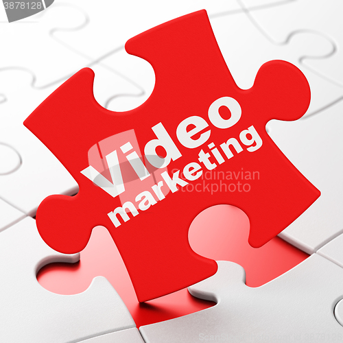 Image of Advertising concept: Video Marketing on puzzle background