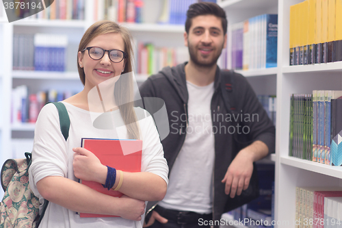 Image of students group  in school  library