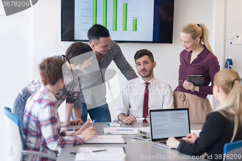 Image of young business people group on meeting at modern office