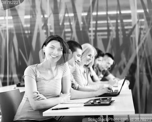 Image of group of students study together in classroom