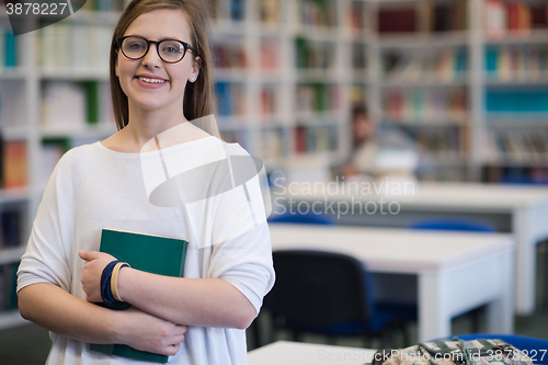 Image of portrait of female student in library