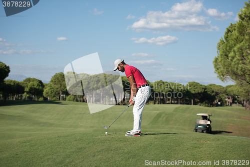 Image of golf player hitting long shot