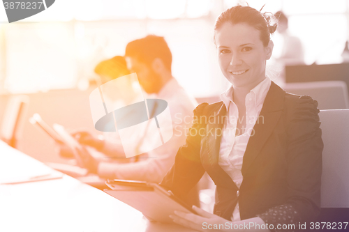 Image of business woman at  office people group on meeting  in background