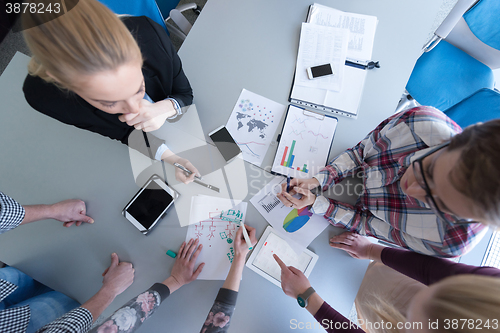 Image of top  view of business people group brainstorming on meeting