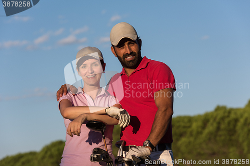 Image of portrait of couple on golf course