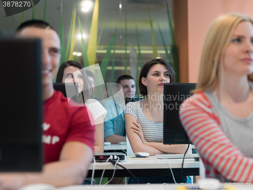 Image of technology students group in computer lab school  classroom