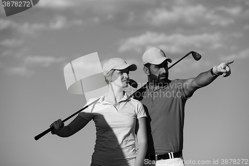 Image of portrait of couple on golf course