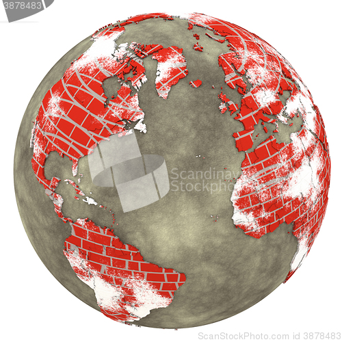 Image of North America and Europe on brick wall Earth