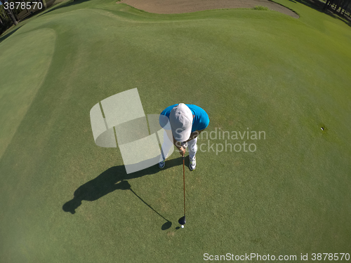 Image of top view of golf player hitting shot