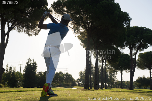 Image of golf player hitting shot