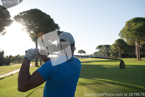 Image of golf player hitting shot