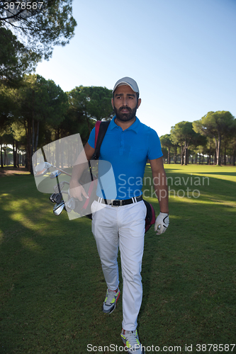 Image of golf player walking