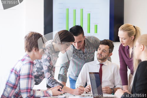 Image of young business people group on meeting at modern office