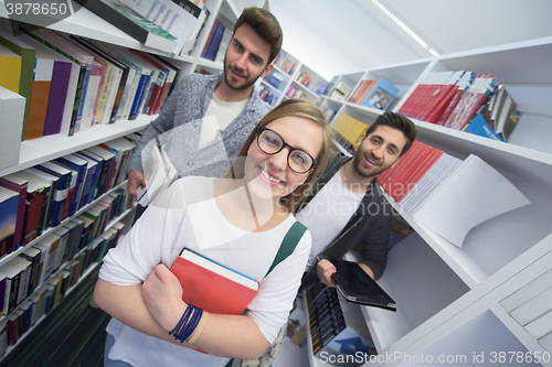 Image of students group  in school  library