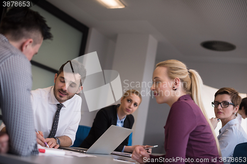 Image of business people group on meeting at modern startup office