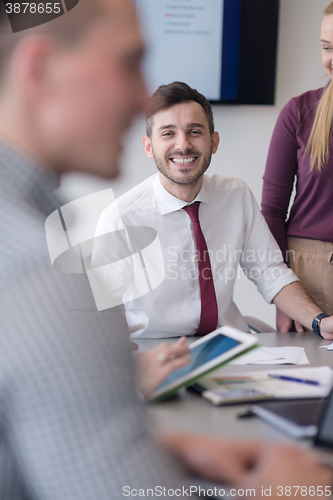 Image of young business people group on meeting at modern office