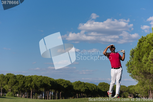 Image of golf player hitting long shot