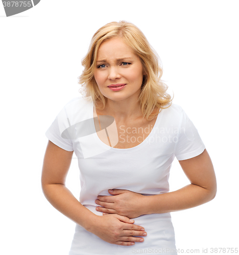 Image of unhappy woman suffering from stomach ache