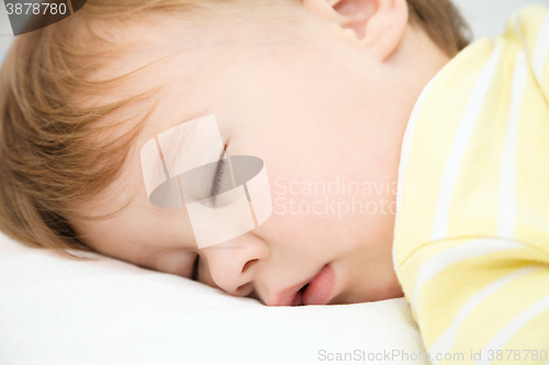 Image of Little boy is sleeping