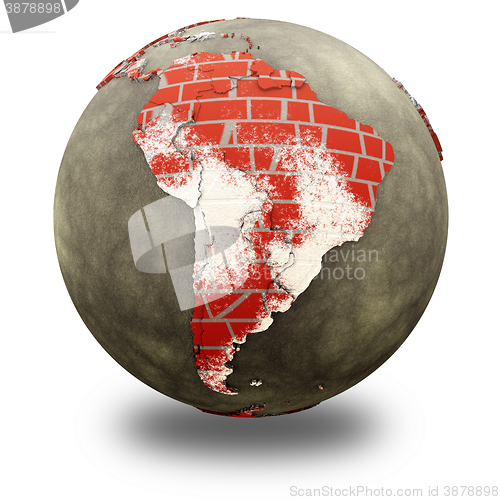 Image of South America on brick wall Earth