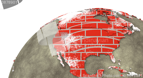 Image of North America on brick wall Earth