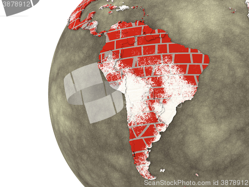 Image of South America on brick wall Earth