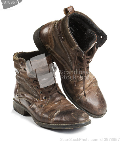 Image of Dirty old boots isolated. white background