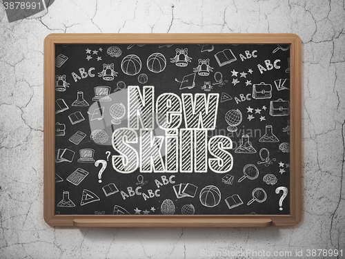 Image of Education concept: New Skills on School board background